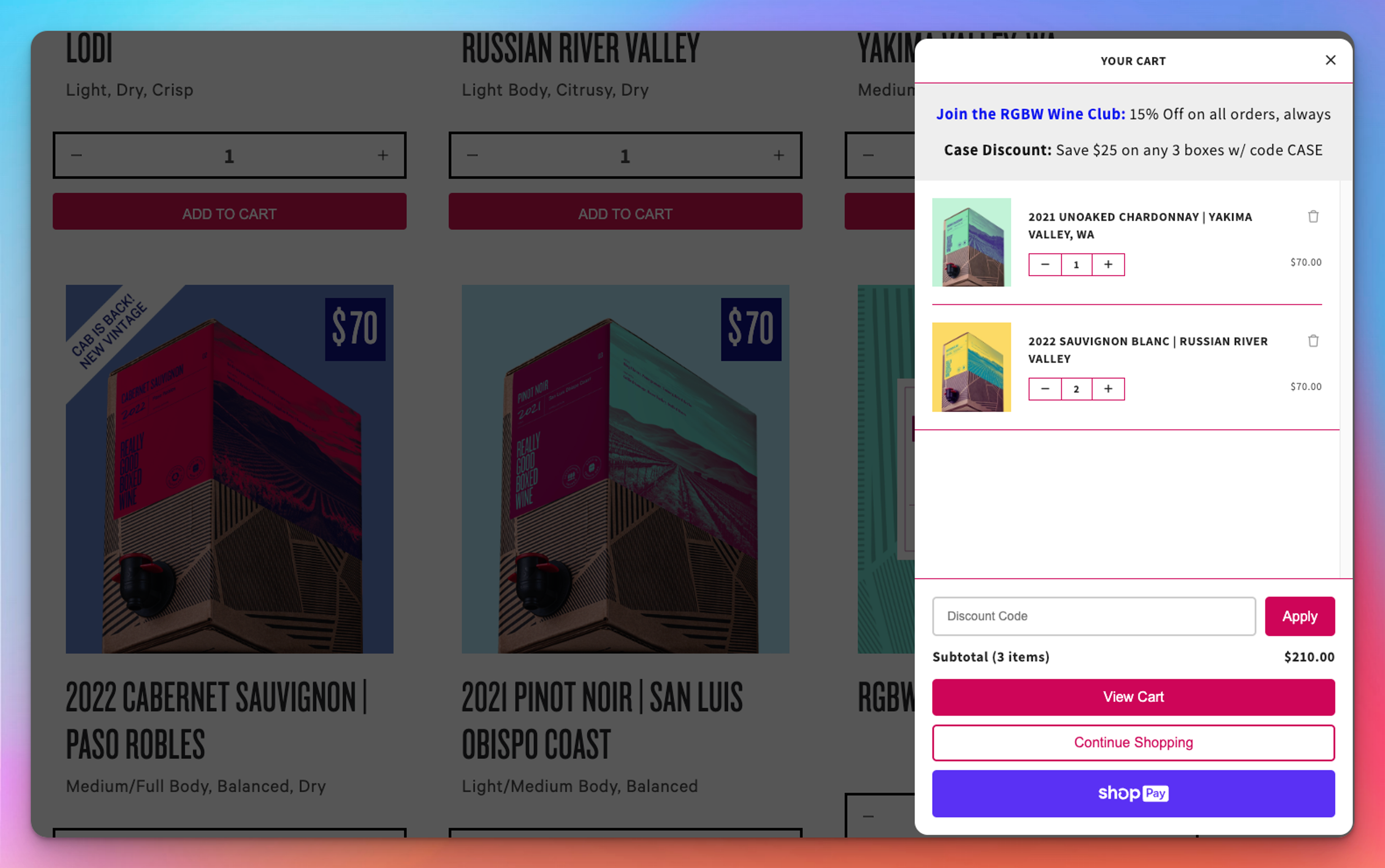 A shopping cart popup displaying three boxed wines, discounts, and checkout options.