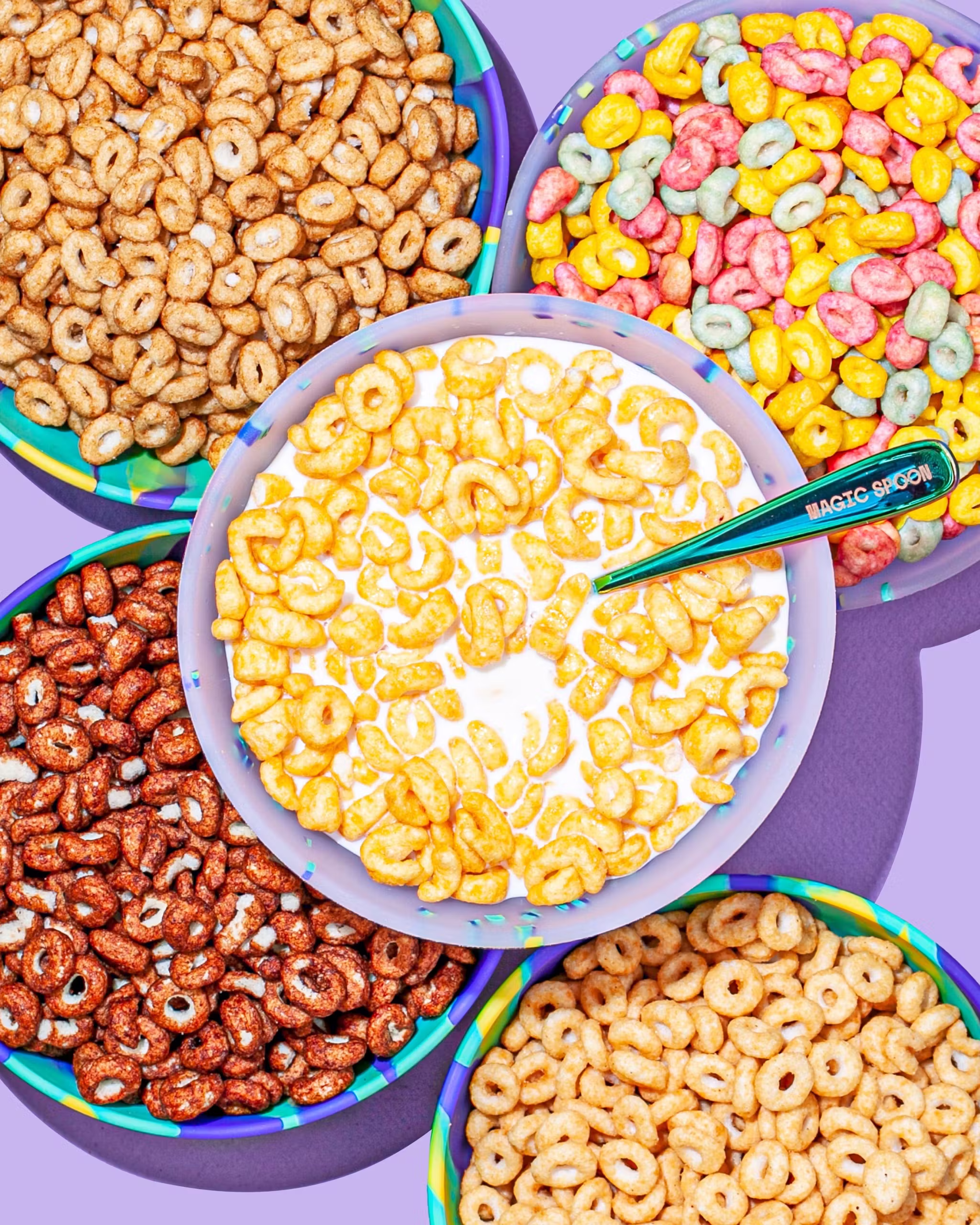 Magic Spoon cereals in bowls with a spoon